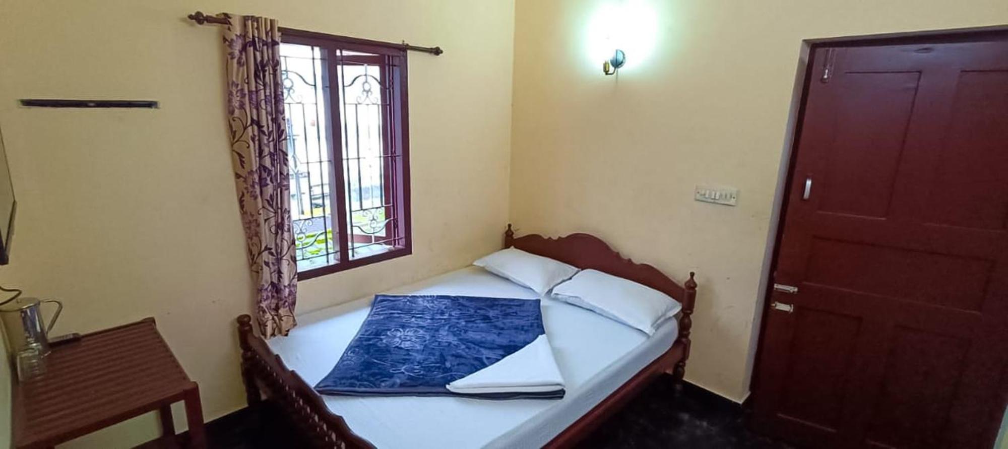 Swarna Tourist Home Munnar Buitenkant foto