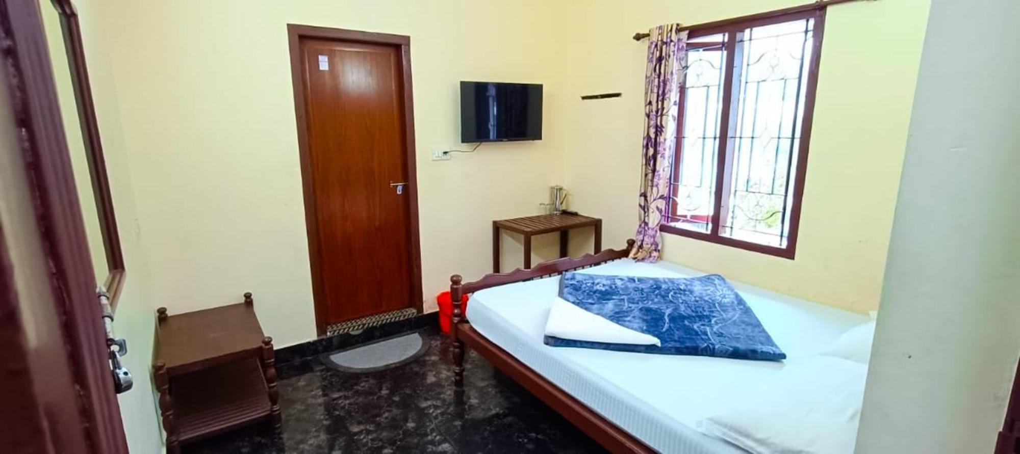 Swarna Tourist Home Munnar Buitenkant foto
