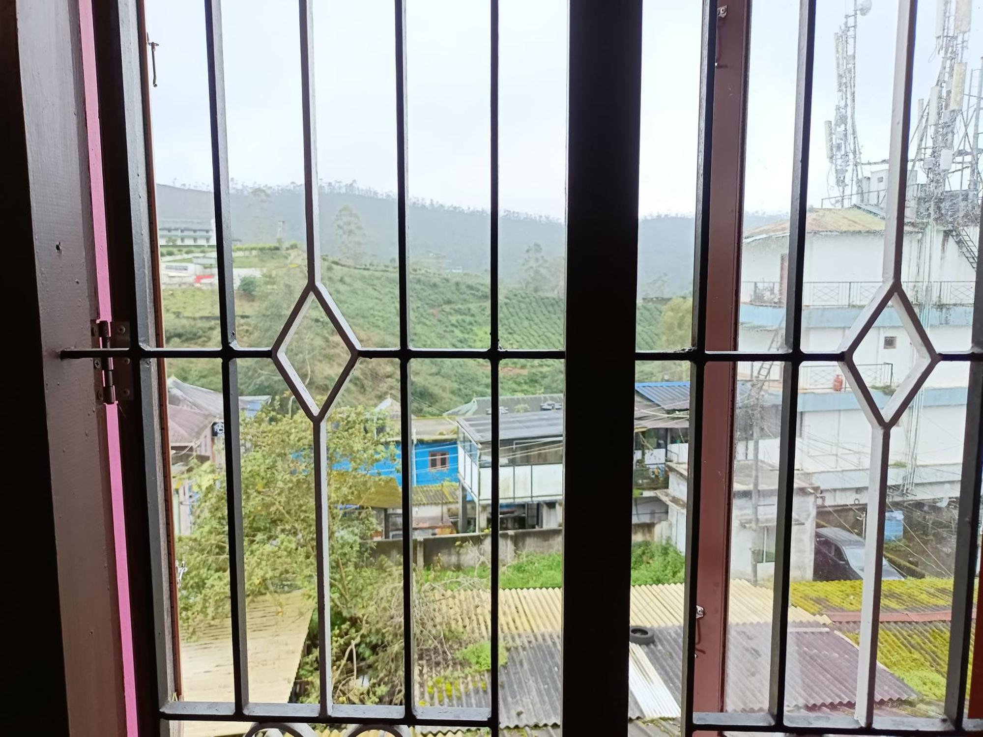 Swarna Tourist Home Munnar Buitenkant foto