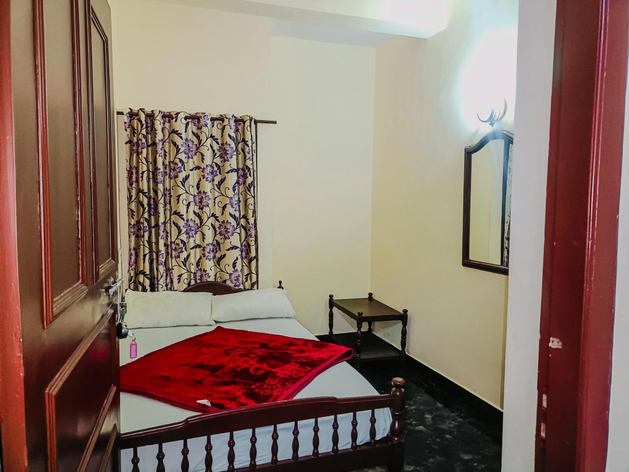 Swarna Tourist Home Munnar Buitenkant foto