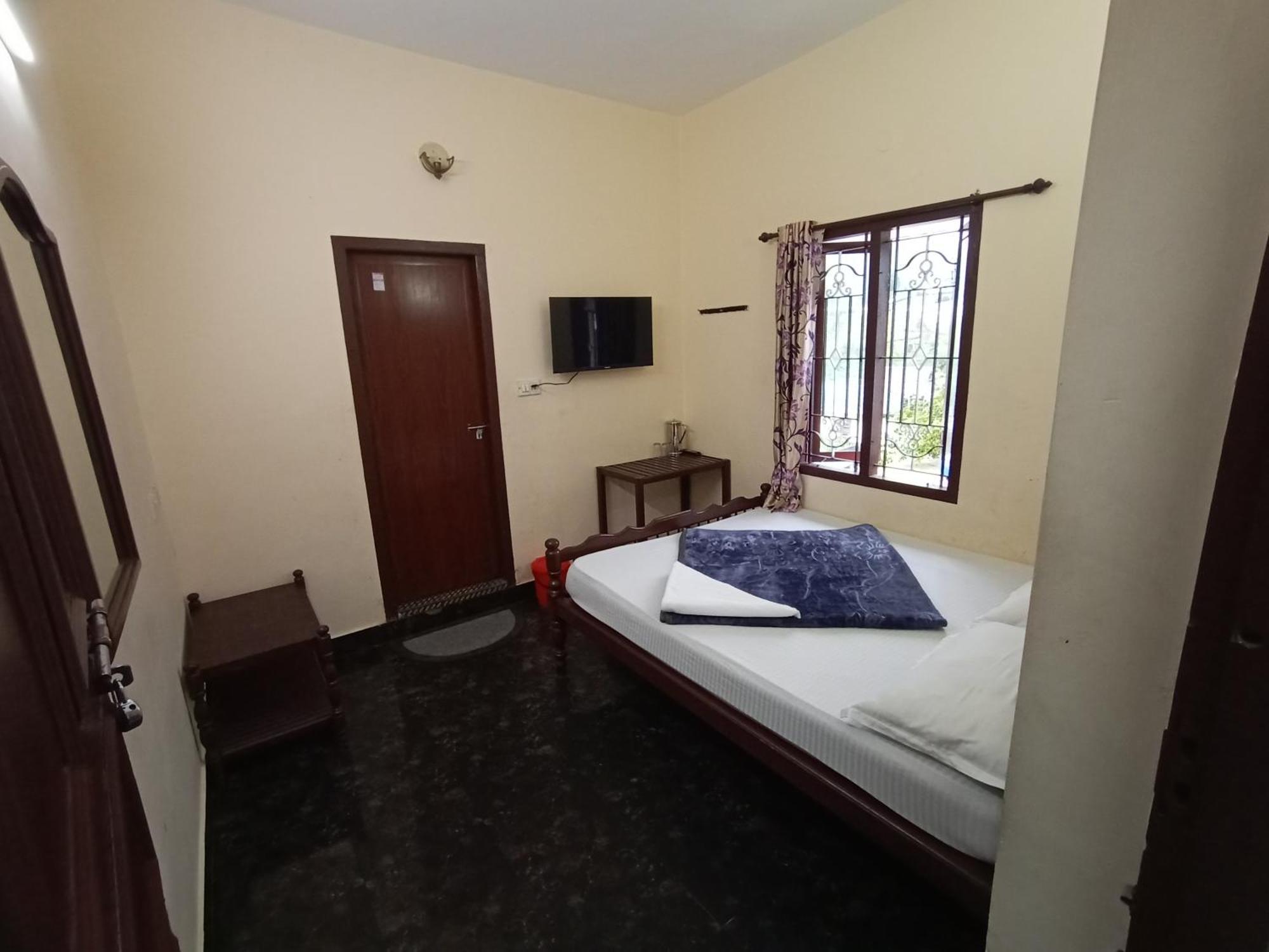 Swarna Tourist Home Munnar Buitenkant foto